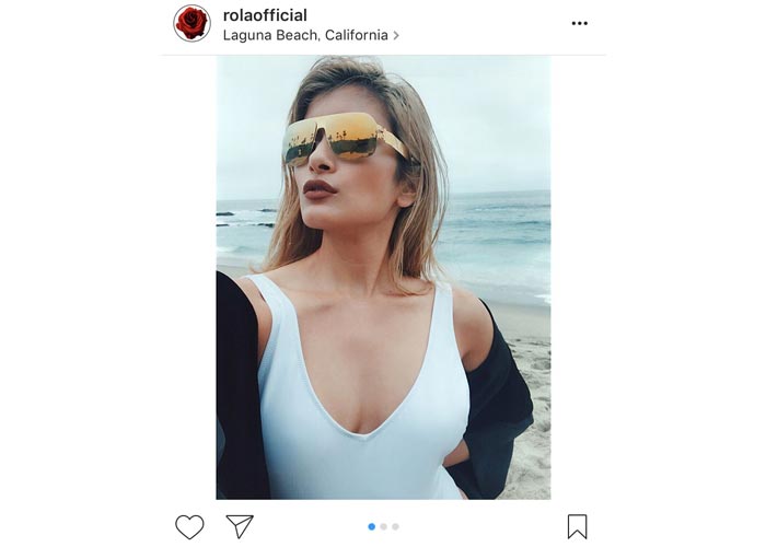 ローラが胸元の開いた白水着を身につけたセクシーで美しい姿を披露！
